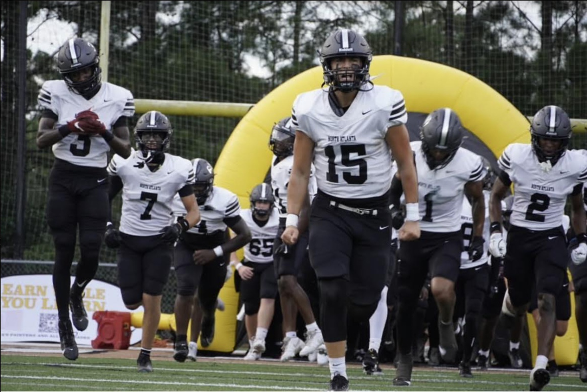 Ready for action: Dubs take the field against Kell High School in the annual Corky Kell Classic