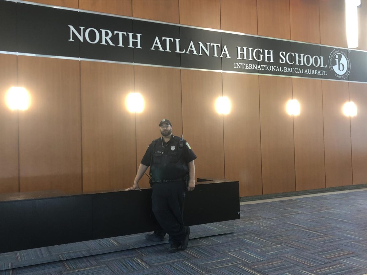 Officer Stephen keeps watch in the lobby.