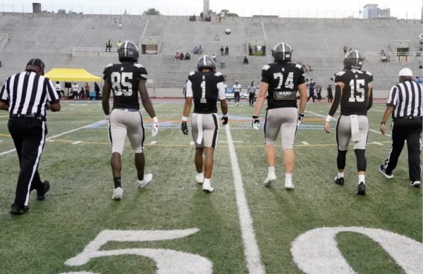 Game Day Ready: the Warriors take on the field, prepared for kick-off. 