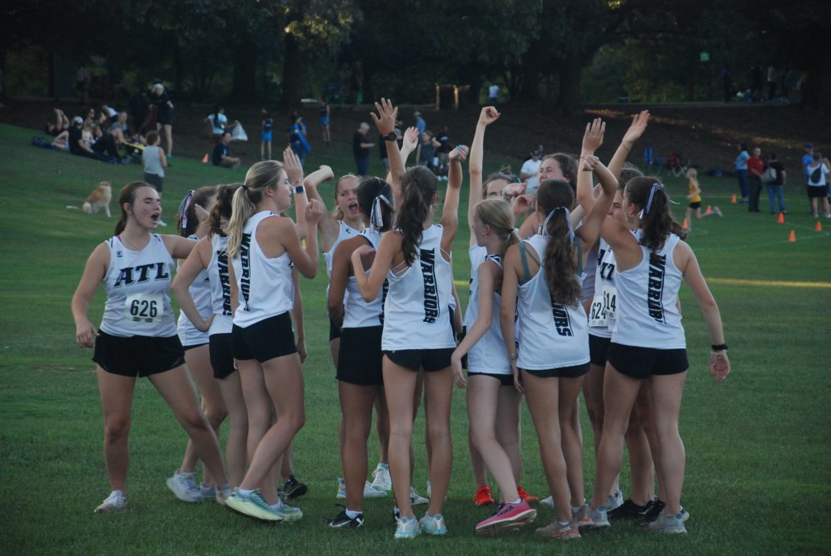 The girls team gets hype pre-race.