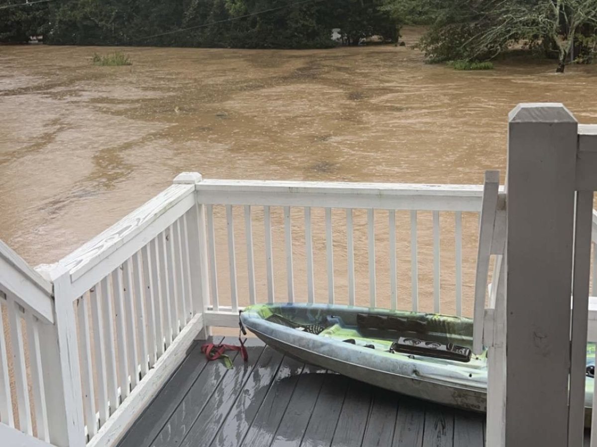 Sophomore Avery Pines’ about to kayak over her front yard during Hurricane Helene.