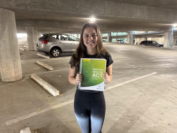 Prepped and ready to go! Junior Blair Carter poses with her ACT prep book.
