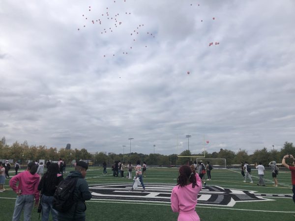 North Atlanta FBLA members reflect on loved ones at the Breast Cancer Awareness Month pink balloon release.