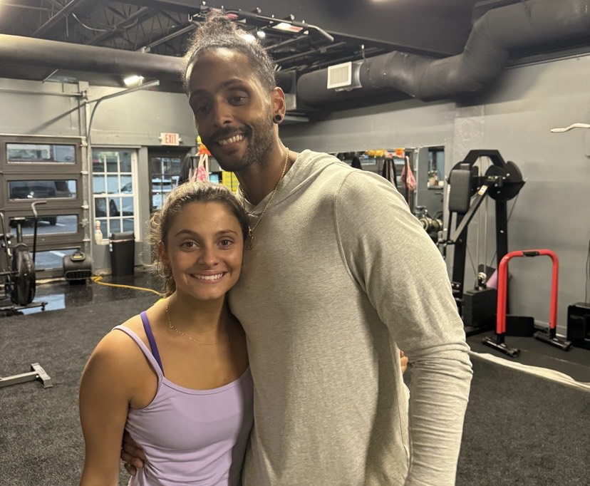 Sophomore Dorothy Perno with her trainer striving for greatness