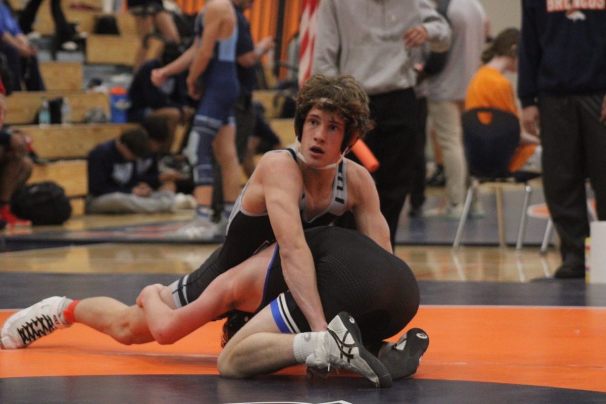 Jack Schultz performs a sprawl during his win against Northwest Whitfield 
