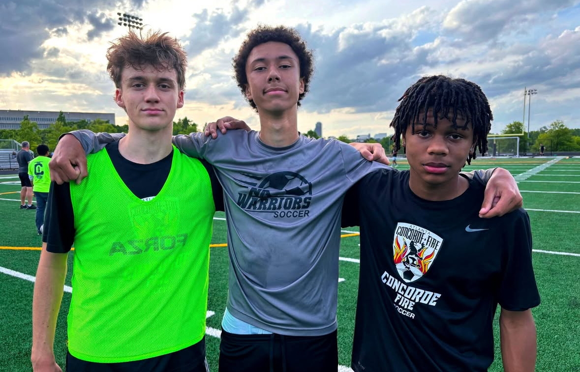 Varsity soccer players, Sully Clausen, Lath Johnson, and Asa Delgado locked in at captain’s practice.
