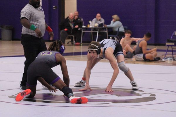 Face-to-face: Senior Jack Schultz squares off against his opponent.