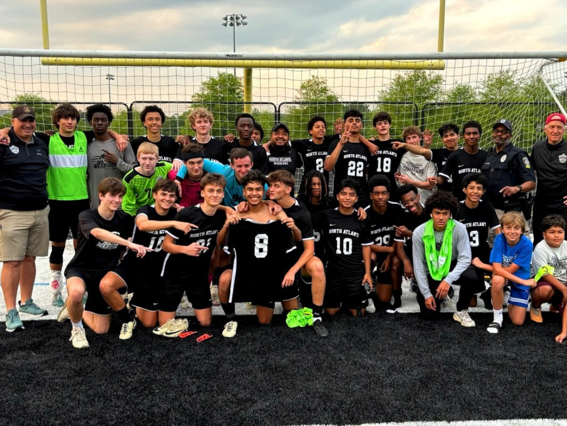 Caption: North Atlanta Men’s soccer team celebrates a big playoff win during the 2024 season