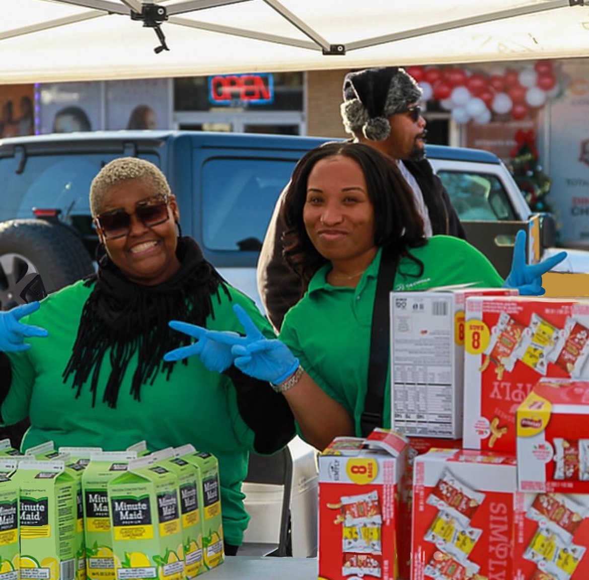 P.O.W.E.R. Inc. volunteers spreading nothing but good vibes during inaugural Welfare Bank event.