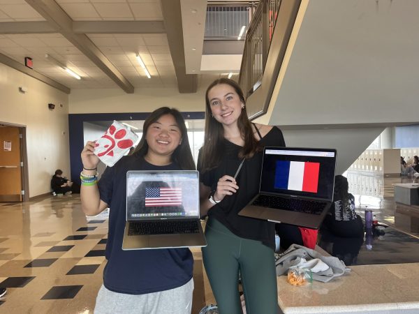 Juniors Michelle Baek and Emily Shull display some of the differences between European and American high schools.